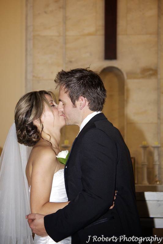 First kiss - wedding photography